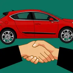 Sprzedałem auto i nie wypowiedziałem umowy OC. Dwie dłonie ściskają się na tle czerwonego samochodu.