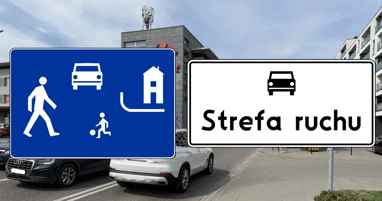 Niebieska tablica informuje o strefie zamieszkania, gdzie piesi mają pierwszeństwo. Obok biała tablica 